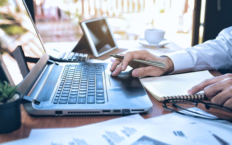 You can trust Cisco to provide your workforce with both broad and targeted endpoint protection Professional working on laptop