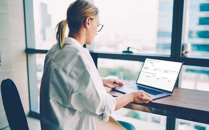 Woman using Merkai Insight VoIP Health monitoring