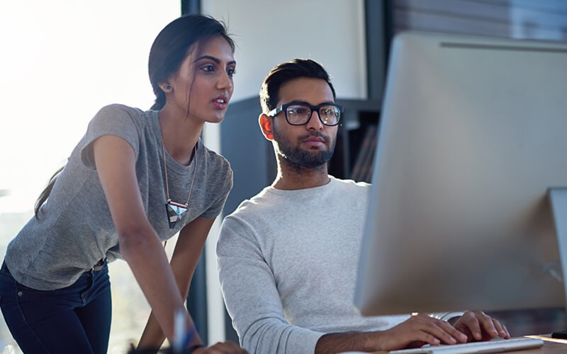 Business man and woman working together