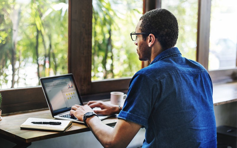 Business man using laptop device